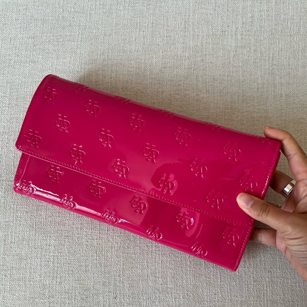Huda Beauty - pink, monogram brush roll/clutch